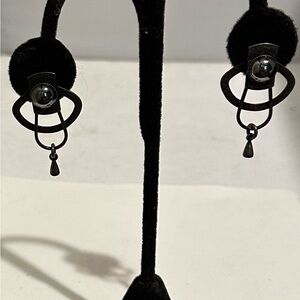 Modernist clip on vintage earrings